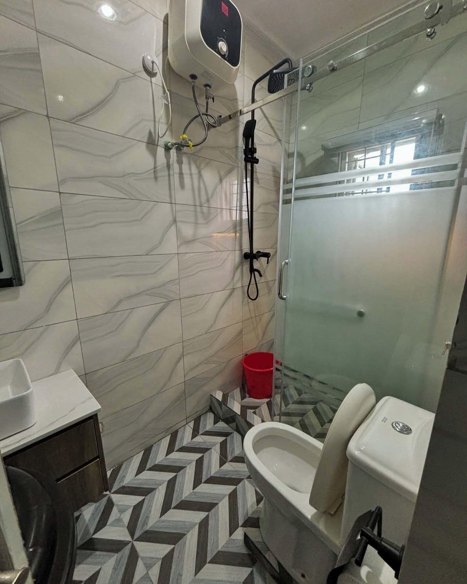 Family Room, Balcony, City View | Bathroom | Free toiletries, hair dryer, towels, soap
