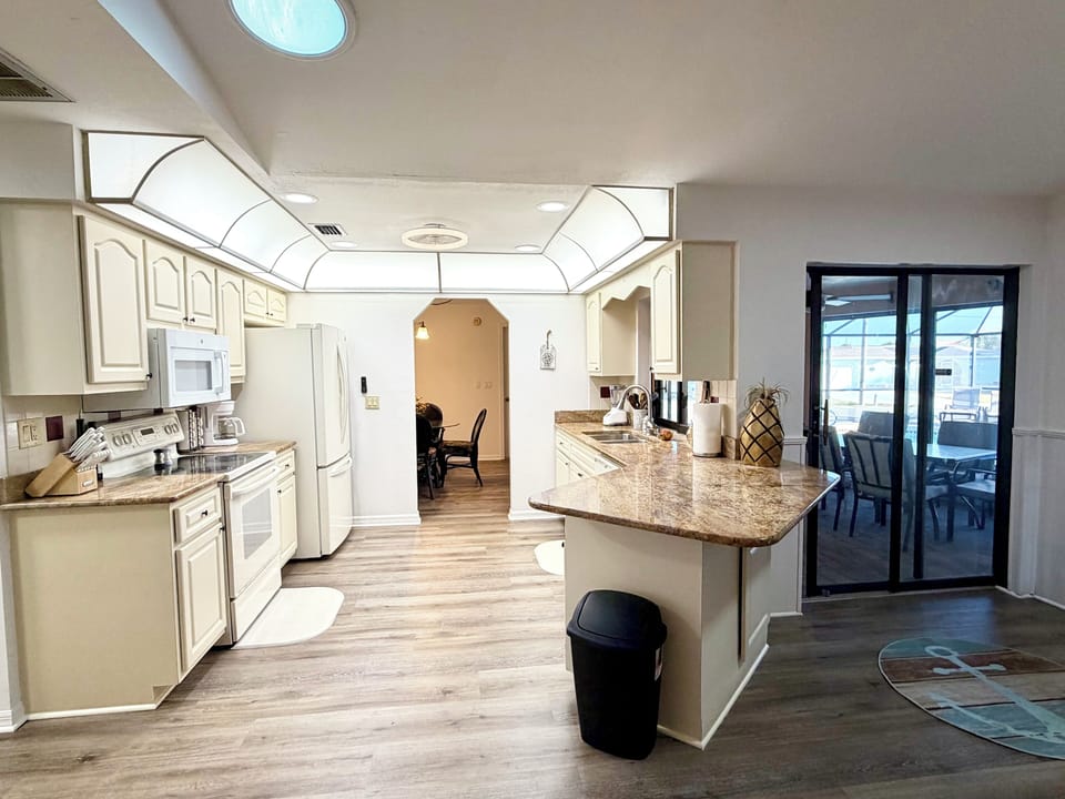 Fully stocked kitchen with dishwasher