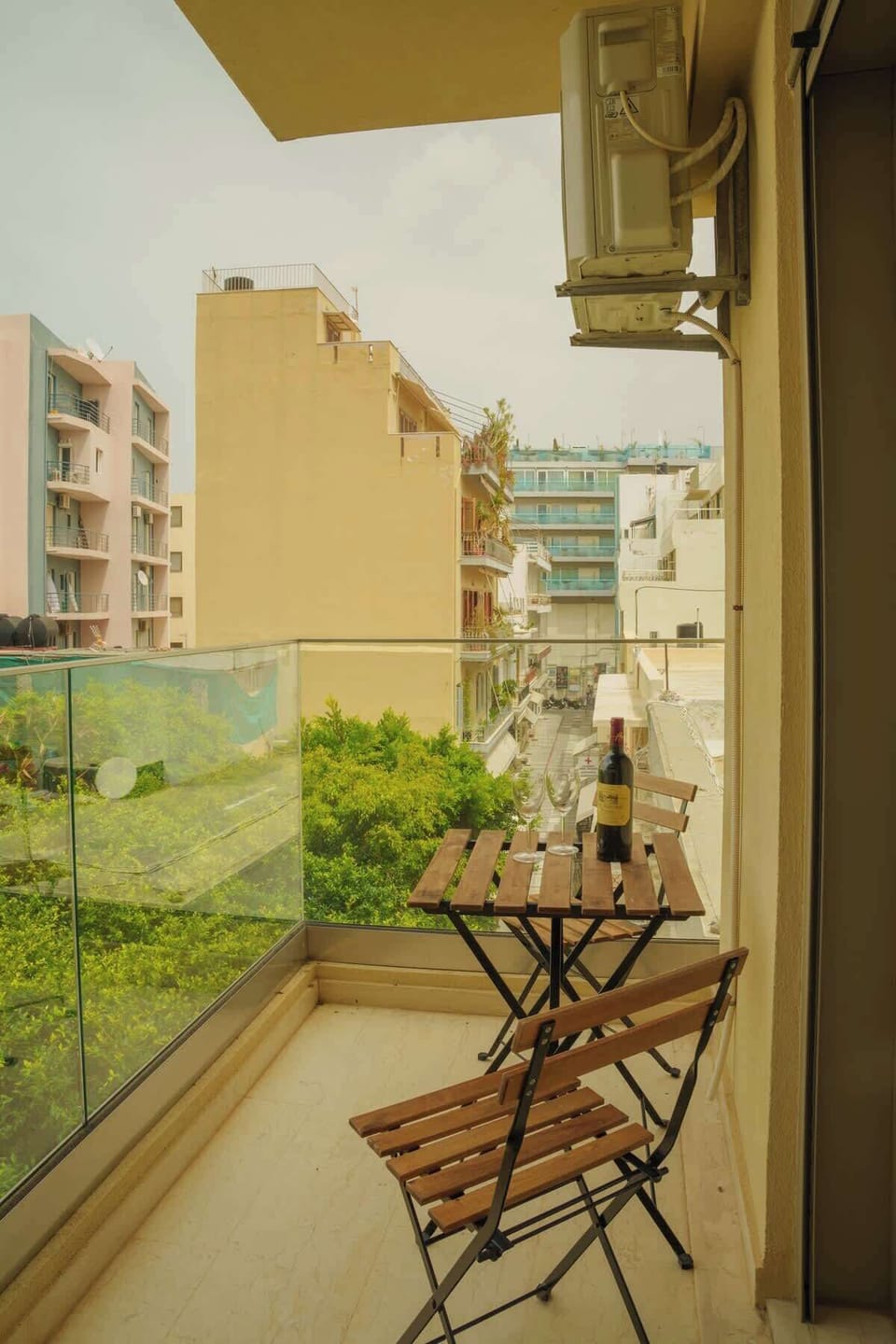 Outdoor Balcony with Table and Chairs for Relaxing Moments