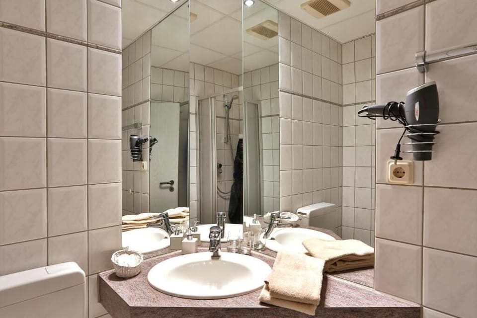 Shower, towels, soap, toilet paper
