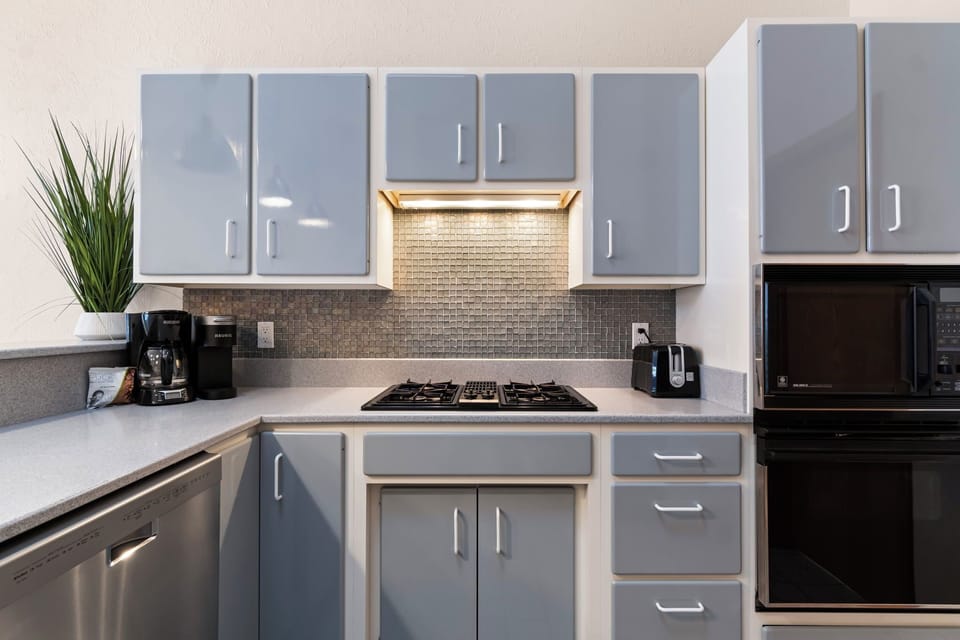 Fully equipped kitchen with modern appliances.