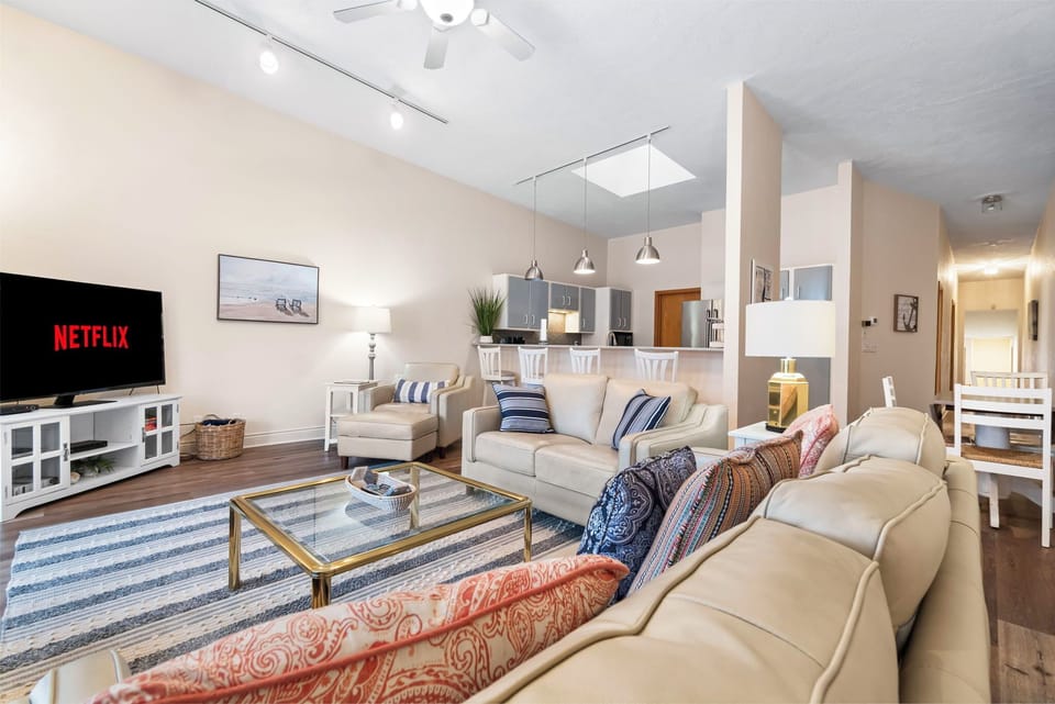 Open living space with vaulted ceilings and comfortable seating.