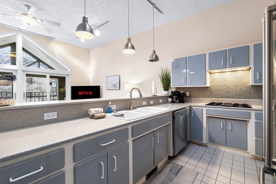 Open kitchen layout with ample counter space for meals at home.
