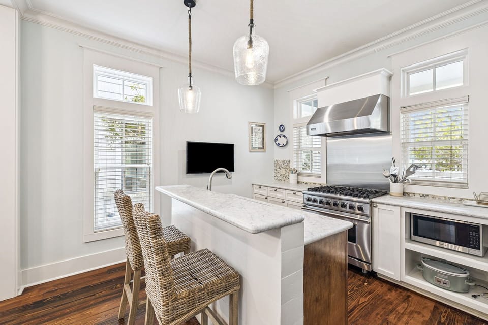 Enjoy Bar Seating for 2 + a Flat-Screen TV