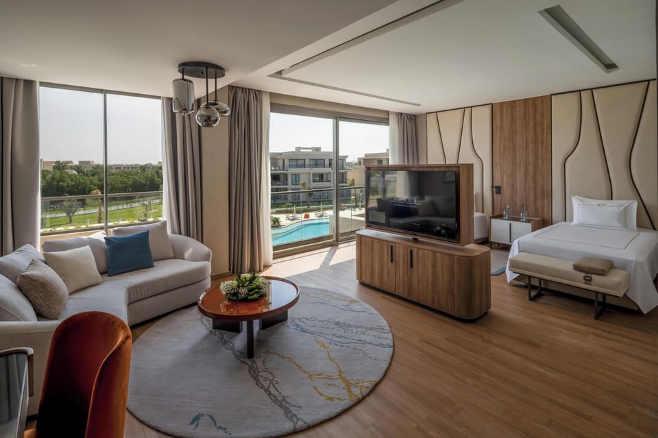 Two Bedroom Skyline Suite With Infinity Pool Adult Only | Living area | 45-inch LCD TV with satellite channels