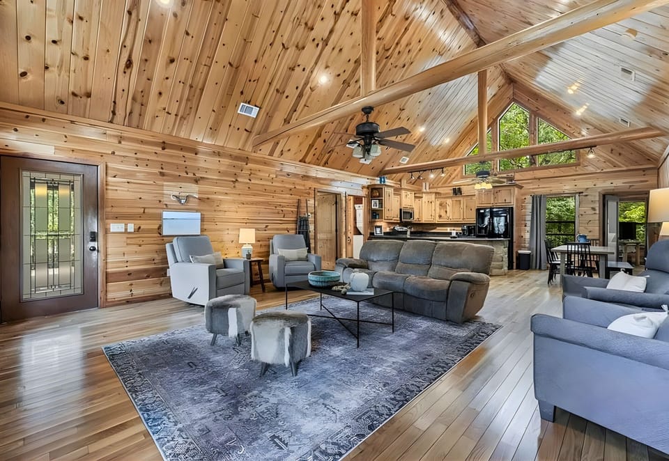 An open layout keeps the living room, kitchen, and dining areas connected.