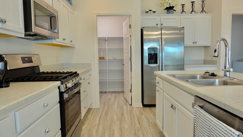 Your fully equipped kitchen features stainless steel appliances, ample counter space, and everything you need to create memorable meals during your stay.