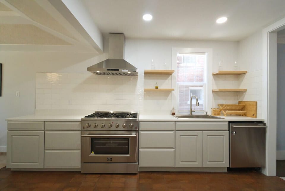 A bright, modern kitchen with sleek stainless appliances—ready for everything from quick bites to full feasts.