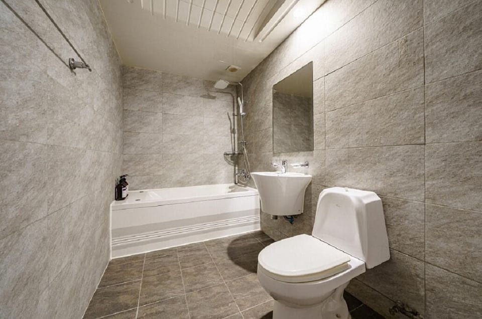 Hair dryer, slippers, towels, soap