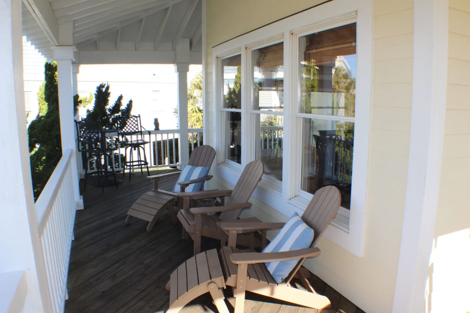 The 400 sq.ft. wrap-around covered deck on Main Floor is a great place to relax.