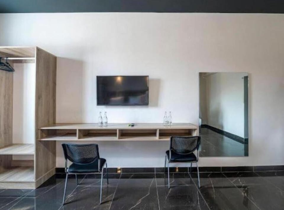 Deluxe Quadruple Room, City View | Interior