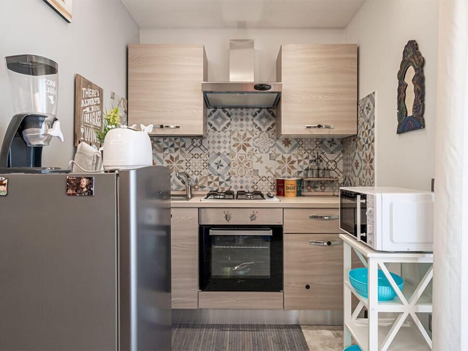 Signature Apartment, Balcony, City View | Private kitchen | Espresso maker, electric kettle