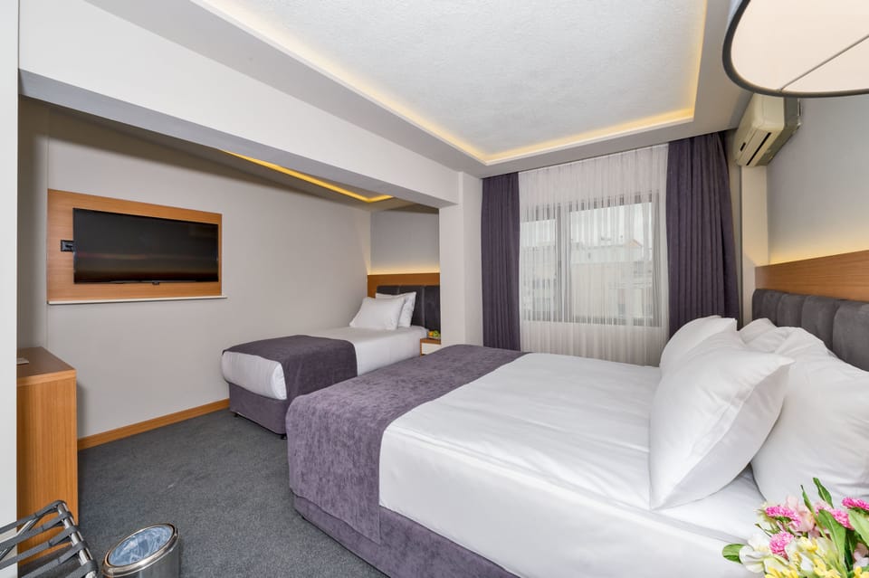 Triple Room | Premium bedding, minibar, in-room safe, desk