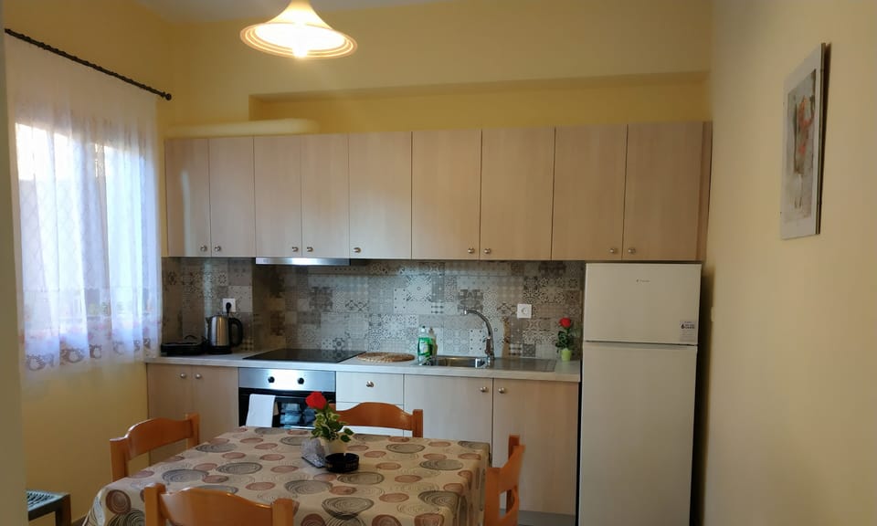 Apartment, 2 Bedrooms, Garden View | Private kitchen | Coffee/tea maker, fridge, stovetop, electric kettle