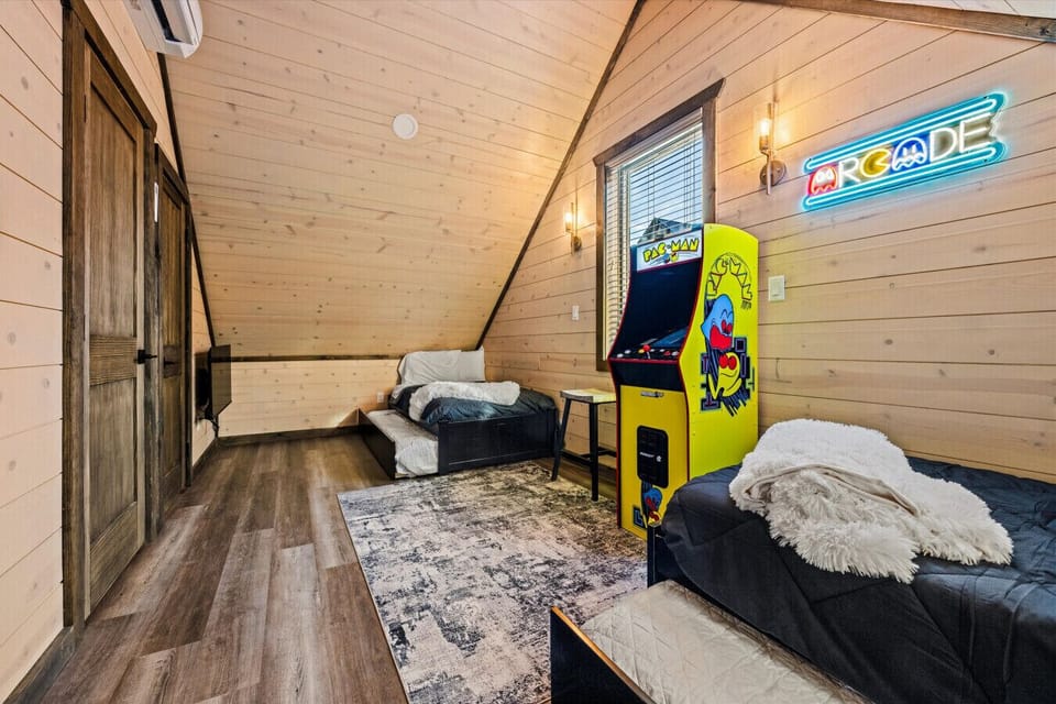 Head up to the arcade loft where Pac-Man runs free-play all night, and the sofas fold down into extra beds when your kids finally crash.