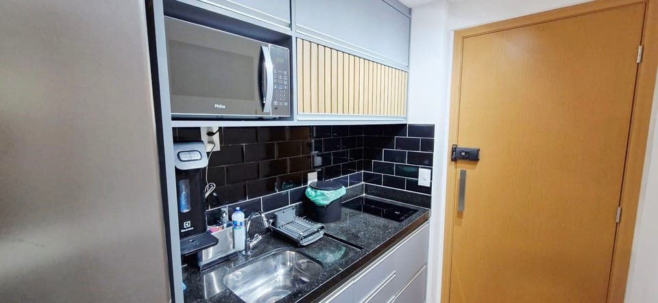Basic Apartment | Private kitchen | Fridge, microwave, stovetop, blender