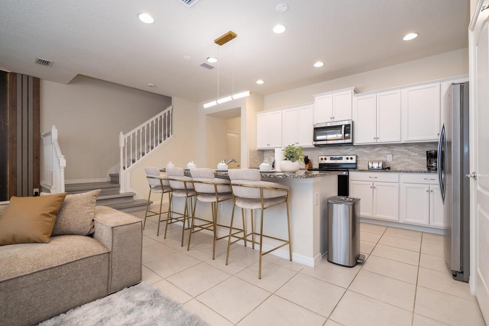 Bright open kitchen and cozy living room for relaxing gatherings