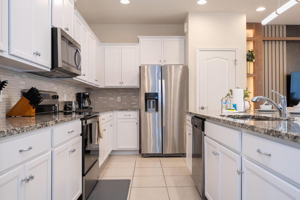 Modern kitchen with sleek appliances and spacious countertops
