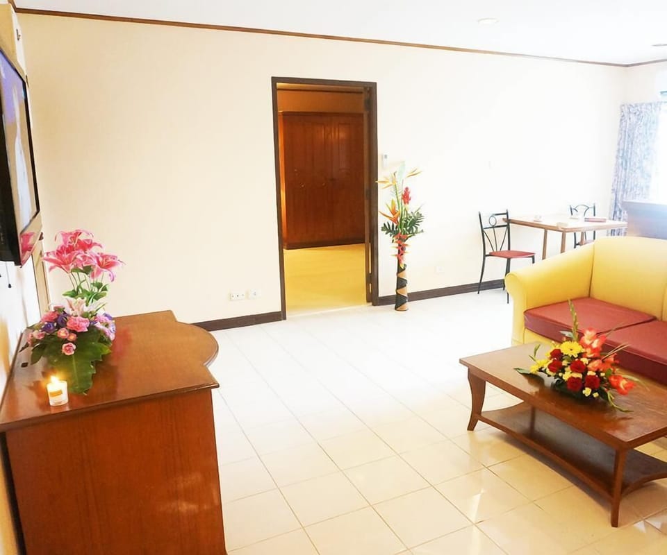 Family Suite, 2 Bedrooms | Living area | Flat-screen TV