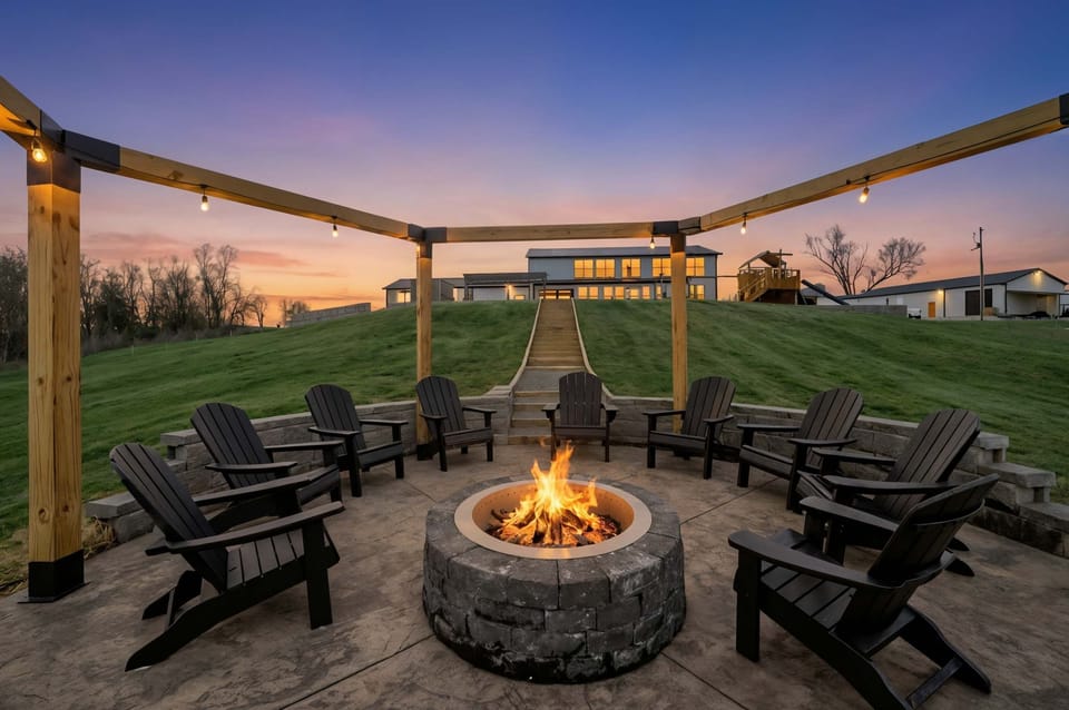 Gather around the cozy outdoor fire pit with comfortable seating, perfect for relaxing evenings under the stars.