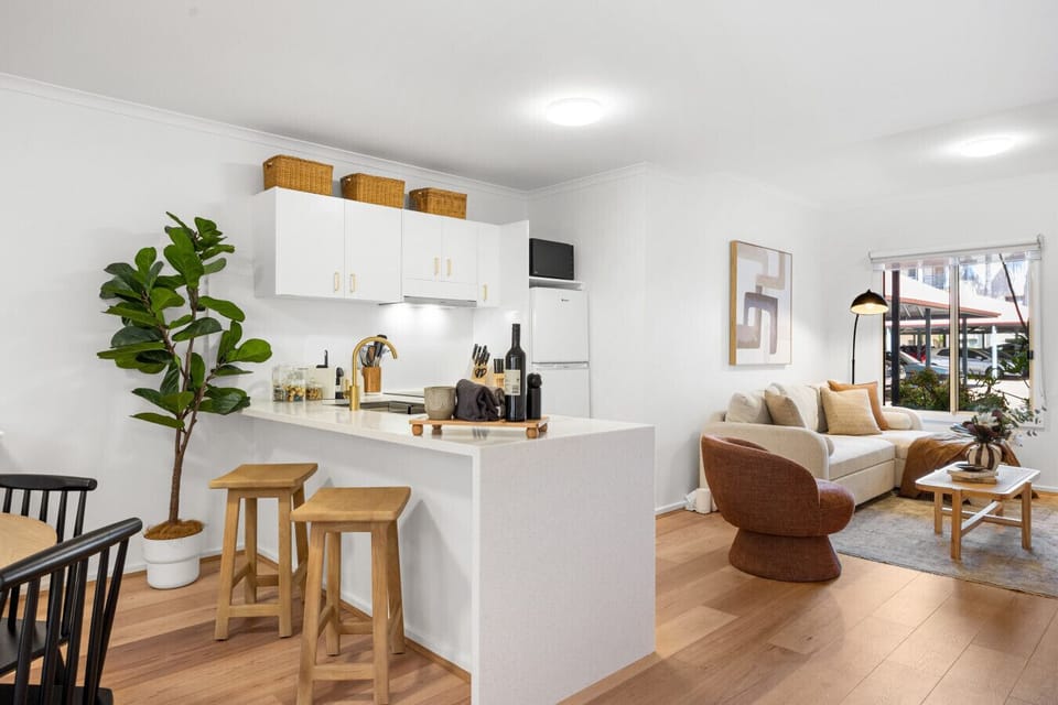 Pull up a stool at the breakfast bar, an ideal spot for casual bites or a morning coffee.