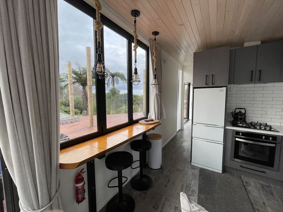 Byfolds open and fold back completely with bar stools inside and out..