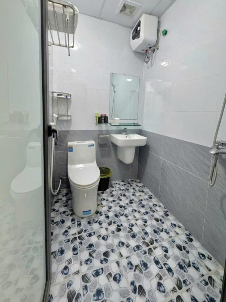Shower, hair dryer, slippers, towels