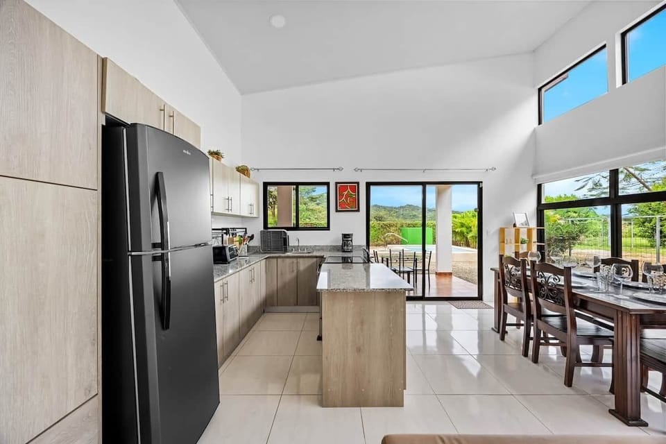 Open kitchen ideal for enjoying time together while cooking.