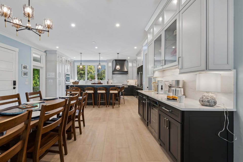 On the main level, the open concept floor plan easily connects the kitchen, dining, and living room together