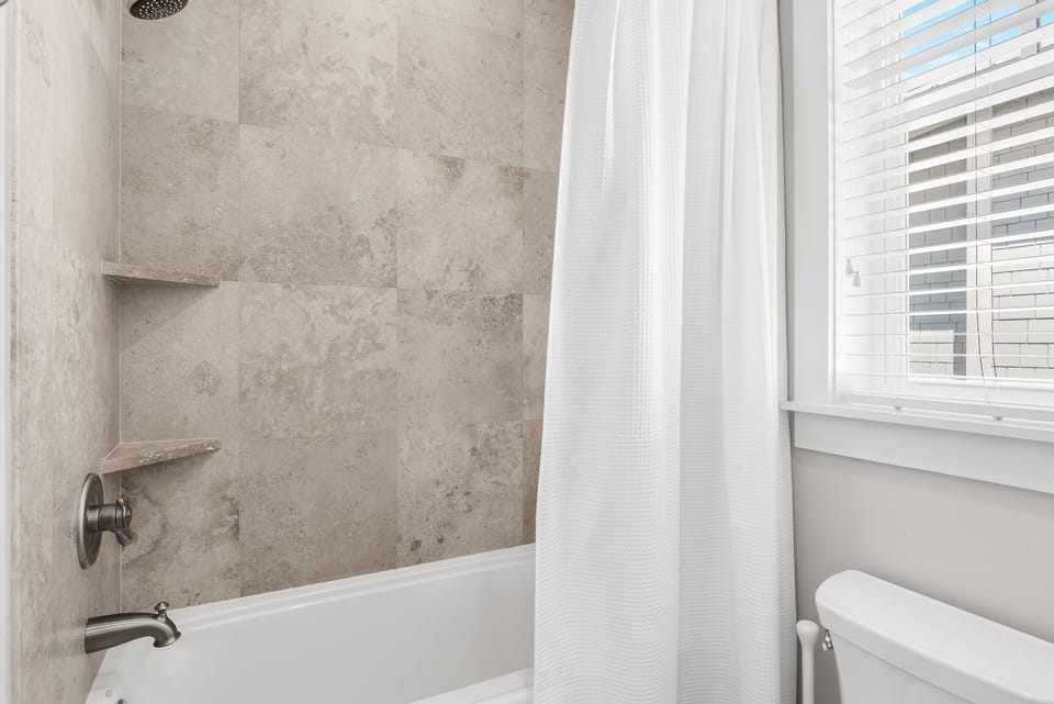 Featuring a Shower Tub Combo