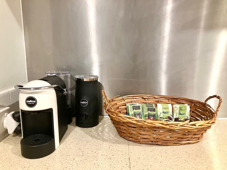 Pod coffee machine + starter pods, teas & sugar to begin your first mornings right.