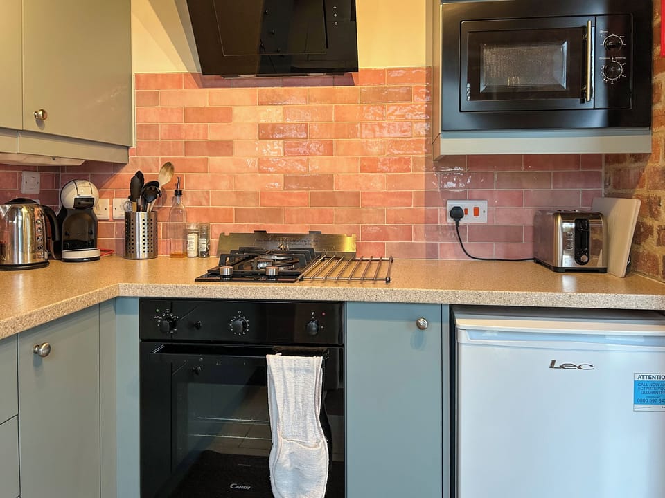 Kitchen | Tansers Barn - Sulby Reservoir Retreats, Welford