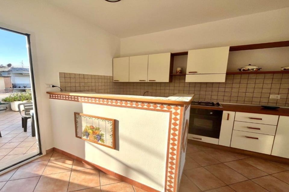 Family Apartment, Multiple Bedrooms, 2 Bathrooms (Appartamento Mare Blu - Terracina) | Private kitchen | Fridge, oven, stovetop, coffee/tea maker
