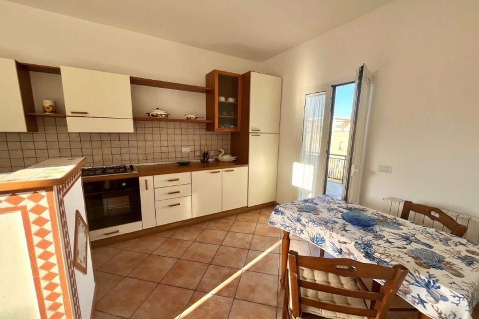 Family Apartment, Multiple Bedrooms, 2 Bathrooms (Appartamento Mare Blu - Terracina) | Private kitchen | Fridge, oven, stovetop, coffee/tea maker
