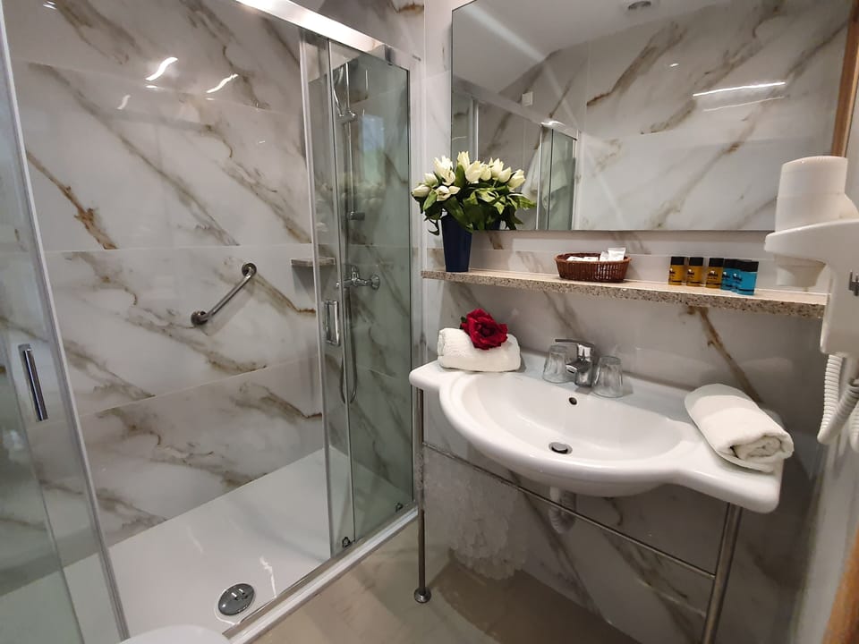 Triple Room, Partial Sea View | Bathroom | Bathtub, free toiletries, hair dryer, soap