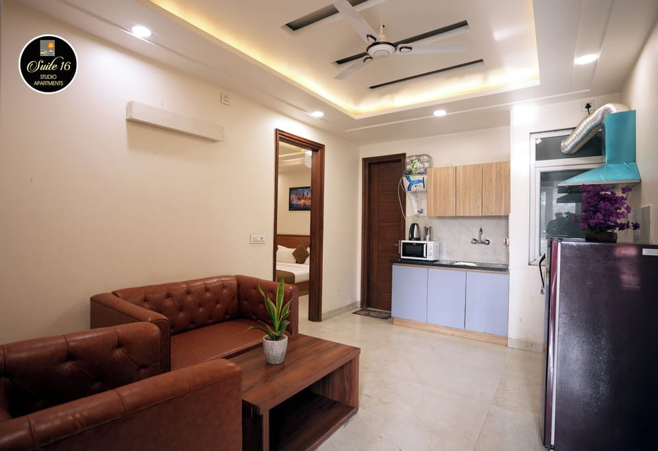 Luxury Apartment, Balcony, Garden View | Living area | TV