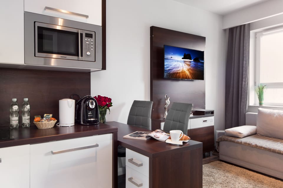 Comfort Apartment, Balcony | Private kitchen | Fridge, microwave, stovetop, dishwasher