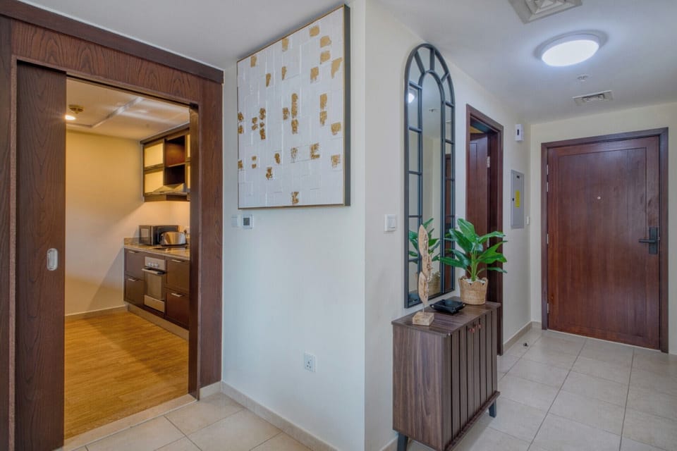 Deluxe Apartment, 1 King Bed with Sofa bed, Balcony, City View | Living area | 43-inch flat-screen TV with digital channels, Netflix