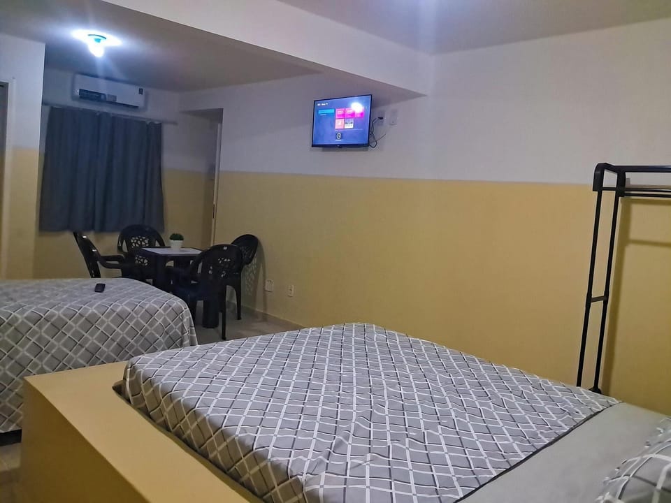 Triple Room | Laptop workspace, blackout drapes, iron/ironing board, free WiFi