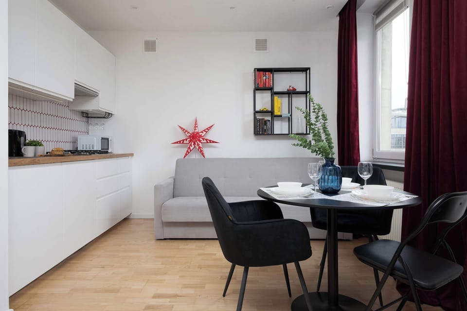 The living area's modern and stylish decor creates a welcoming atmosphere. 