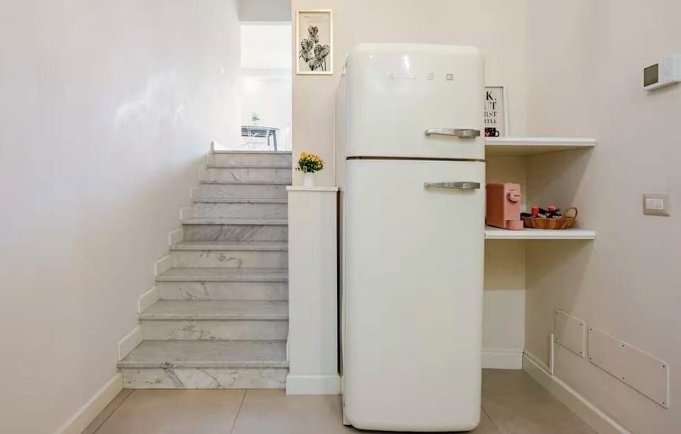 Deluxe Apartment, Courtyard View | Private kitchen | Espresso maker, coffee/tea maker, electric kettle, toaster
