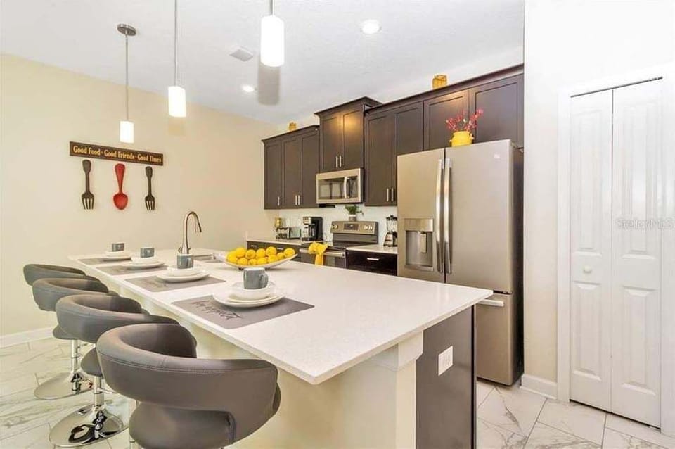 Townhome, 4 Bedrooms | Private kitchen | Coffee/tea maker, fridge, oven, toaster