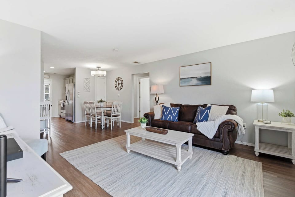 Curl up in the airy living room & stream your favorites on the smart TV​