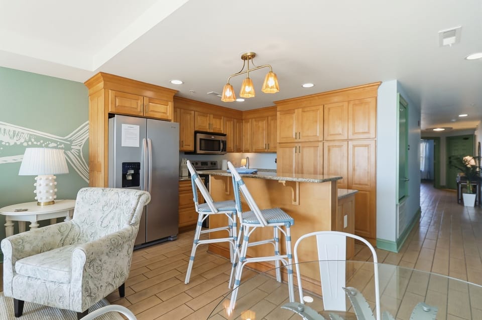 Step into the heart of the home.
An open-concept kitchen that overlooks the living and dining areas.
Bright, simple, and designed for everyday use.