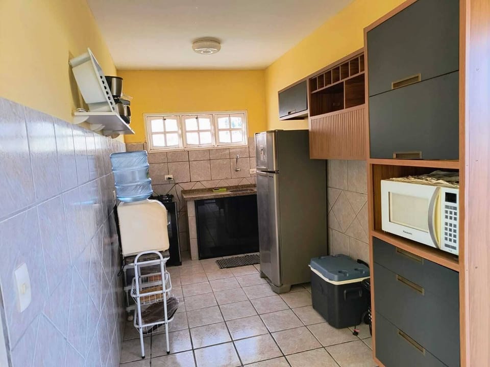 Family House, Lanai | Private kitchen | Full-size fridge, microwave, oven, stovetop