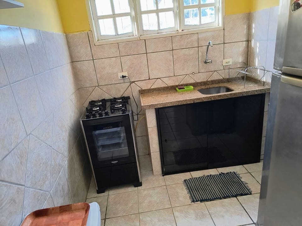 Family House, Lanai | Private kitchen | Full-size fridge, microwave, oven, stovetop