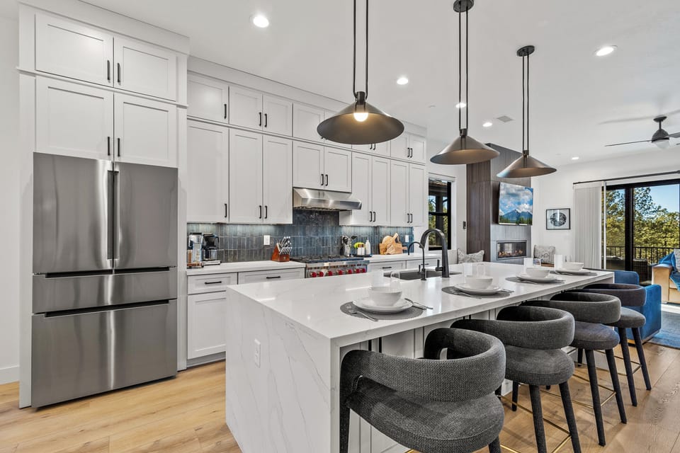 Chef’s kitchen with large island, Wolf gas cooktop & seating for gatherings
