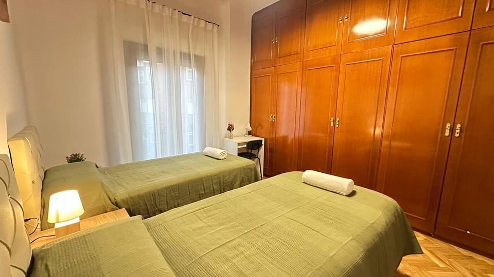 Twin Room, Shared Bathroom | Iron/ironing board, free WiFi