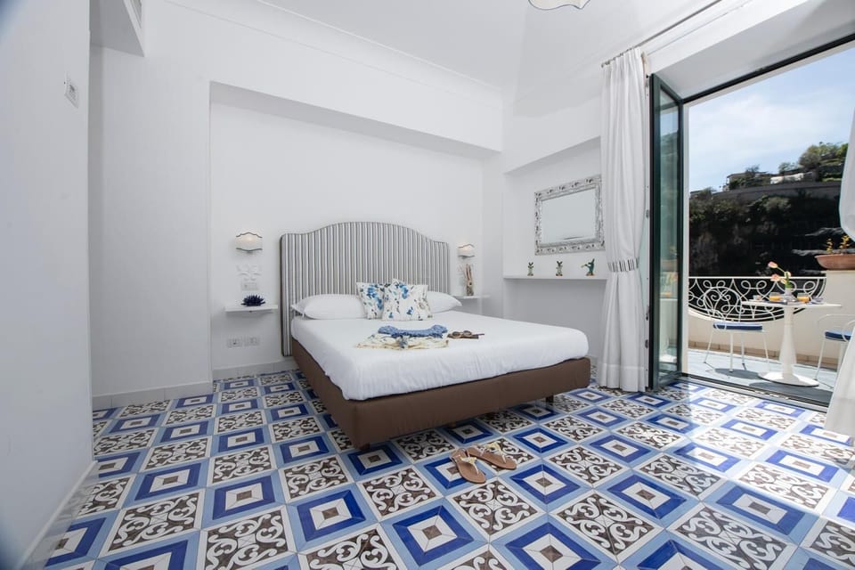 Comfort Room, Balcony, Sea View | In-room safe, free WiFi
