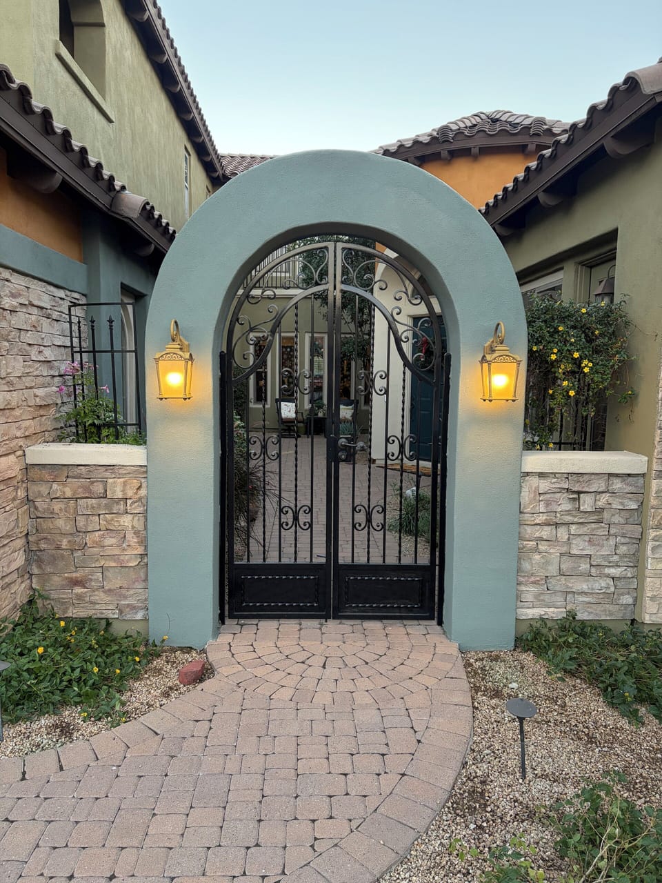 Welcoming gated entry to the property